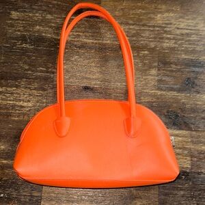 orange purse practically brand new never used or put anything in purse